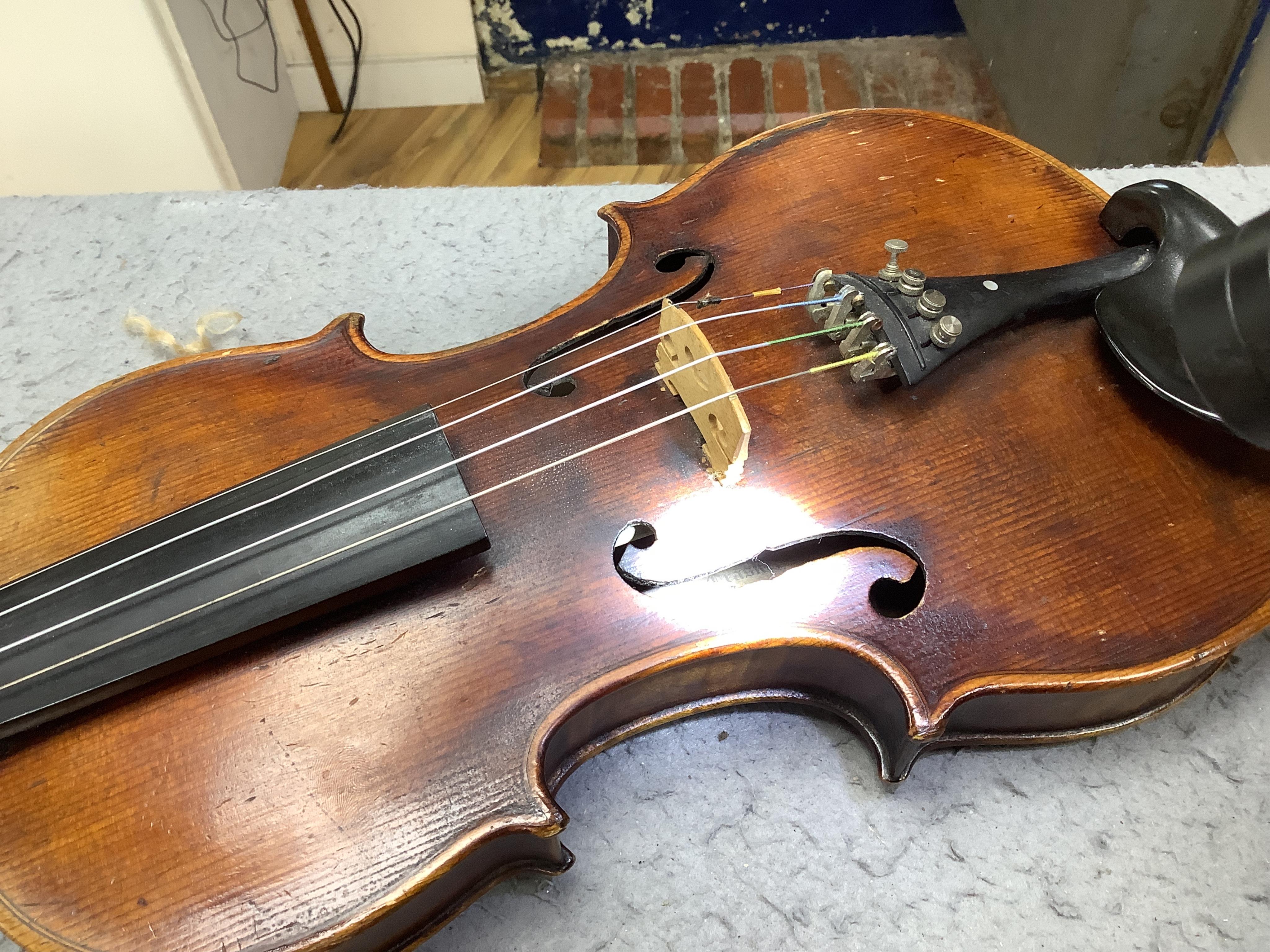 A cased 19th century English violin, with label reading George Craske, Fecit 1842, Edward Crompton, 54, Barton Arcade, Deansgate, Manchester, body length 36cm. Condition - fair to good.